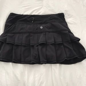 Lululemon tennis skirt with adorable ruffle back detail & zipper pocket